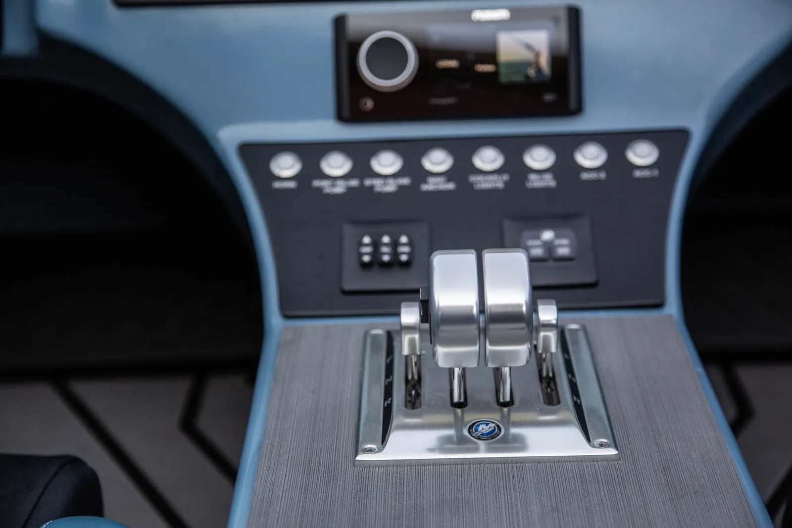 Mercury stainless steel dual throttle with easy access to switch and Fusion RA770 audio control display