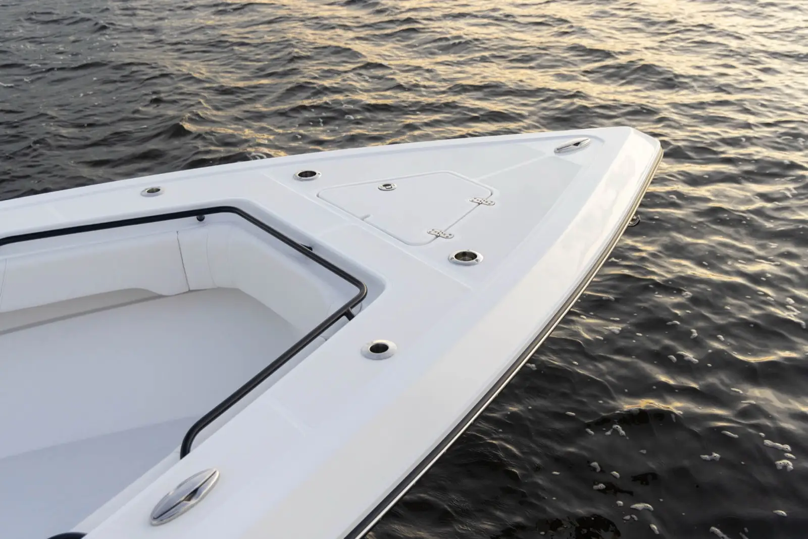 Bow anchor locker offers storage for available windlass anchor, complete with stainless steel plow and rode kit